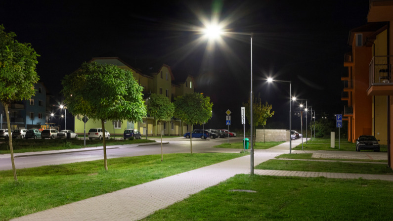 LED streetlights along a neighborhood at night.